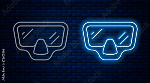 Glowing neon line Diving mask icon isolated on brick wall background. Extreme sport. Diving underwater equipment. Vector