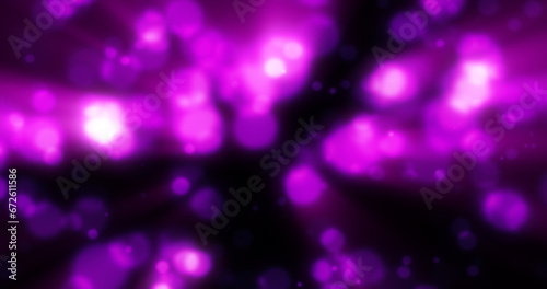 Abstract purple blurred holiday background with magical bokeh of glowing bright light energy small particles of flying dots on a black background