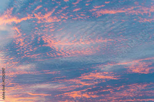 sunrise in the sky with purple colors in the clouds