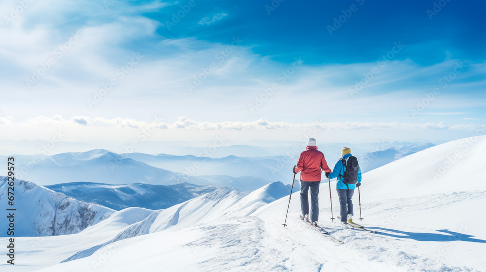 Two skiers standing on top of a mountain and enjoying the view