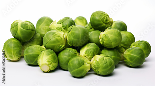 a pile of brussels sprouts on a white surface