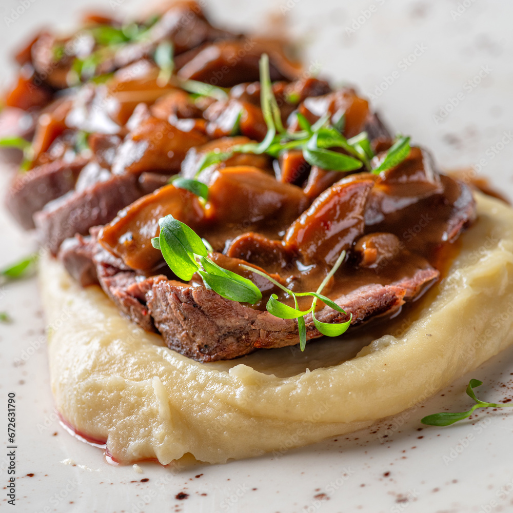 Tagliata veal with mashed potatoes and mushrooms - obrazy, fototapety, plakaty 
