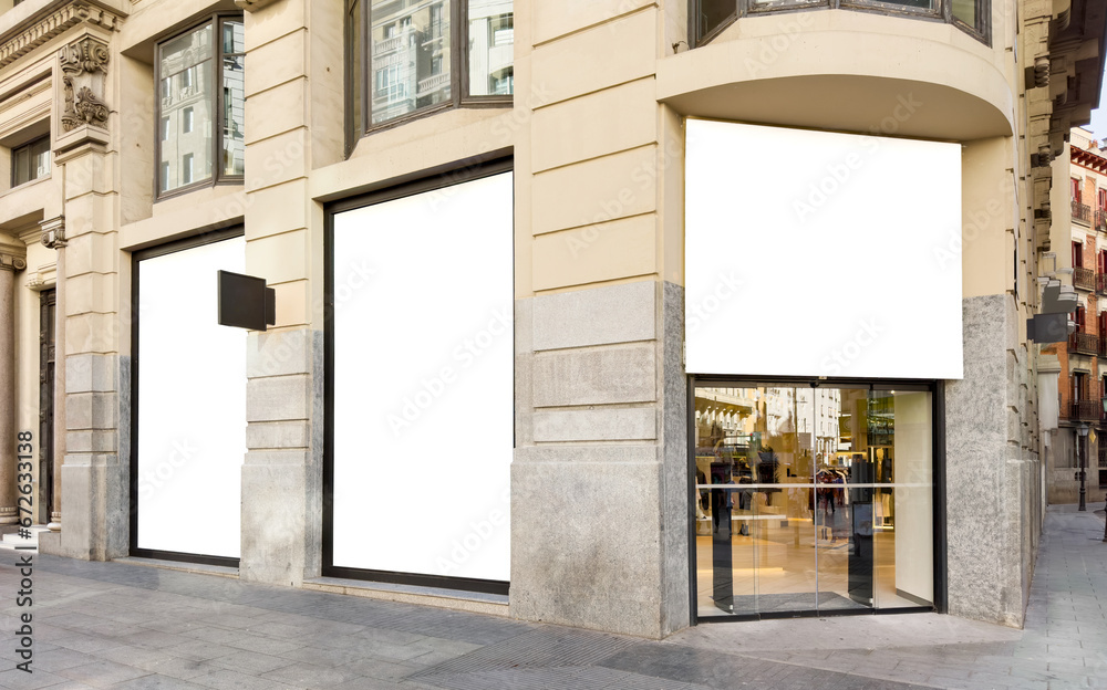 Fototapeta premium Fashion clothing storefront facade and blank windows for your own branding
