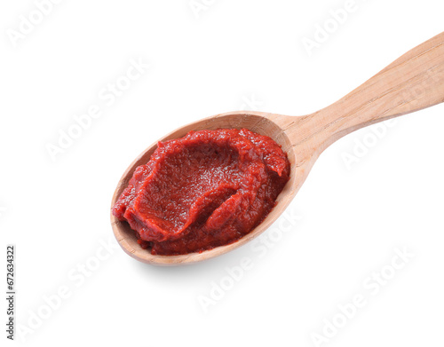 Wooden spoon of tasty tomato paste isolated on white