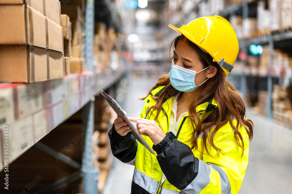 Portrait asian engineer woman shipping order check goods supplies export, import, goods, factory, warehouse, international trade, transportation ,cargo ship, logistic, distribution.business industry Portrait asian engineer woman shipping order check goods supplies export, import, goods, factory, warehouse, international trade, transportation ,cargo ship, logistic, distribution.business industry