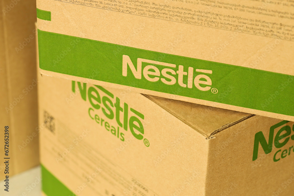 KYIV, UKRAINE - MAY 4, 2022 Big cardboard boxes with logo of Nestle ...