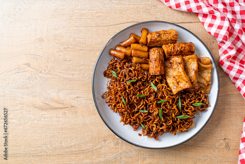 Jajangmyeon or JJajangmyeon with Odeng and Omuk - Korean Instant noodles with Korean fish cake in black bean sauce photo