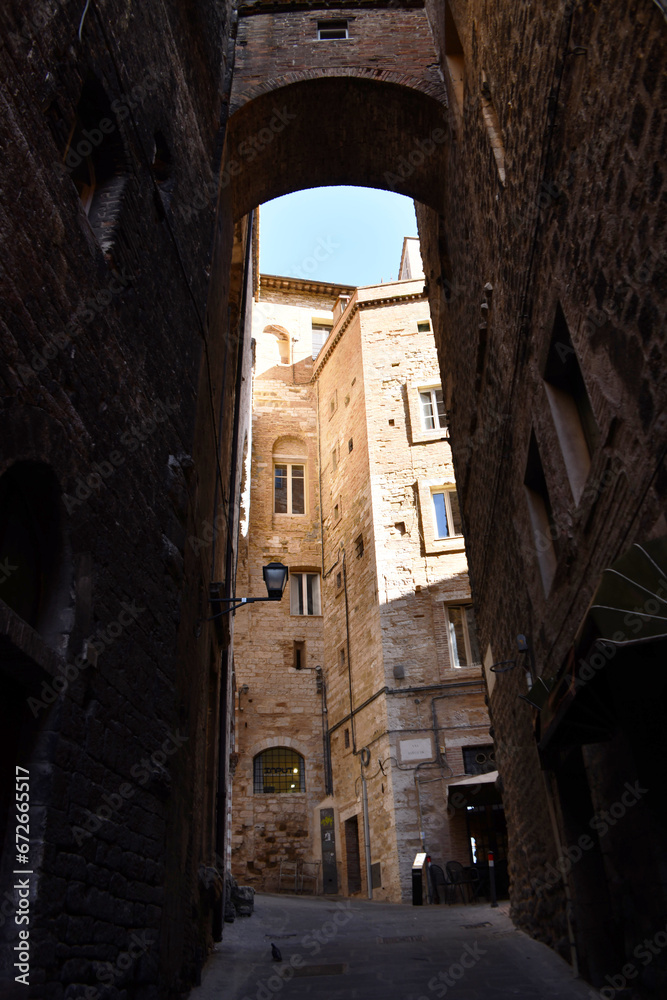 Fototapeta premium A close-up of the walls of an old arched passage in the city of Perugia