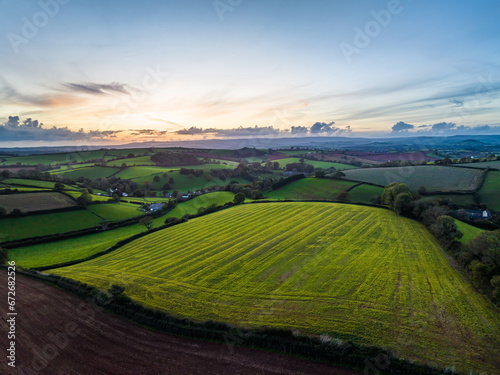 Sunset over Fields and Farms from a drone, Torquay, Devon, England, Europe