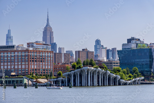 Close-up view of Little Island and Midtown Manhattan as seen from a boat on the Hudson river, New York City, USA photo