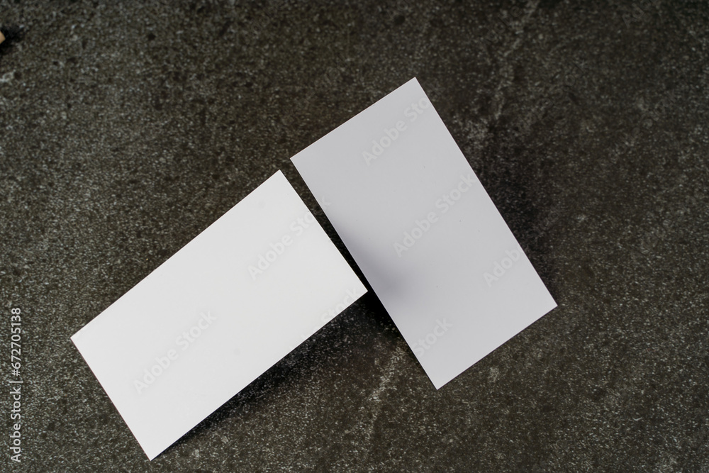 Business card mockup, front and back, on a dark background, a template for design presentation, thick cardboard visiting cards floating on black Business card mockup, front and back, on a dark background, a template for design presentation, thick cardboard visiting cards floating on black