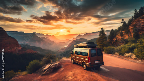 Motorhome camper van RV road trip. People on travel vacation adventure. Tourists in rental car campervan by view of mountains in beautiful nature landscape at sunset