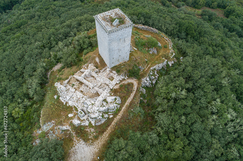 Aerial Drone view. The homage tower is what remains of the medieval castle of Portela da Pena, in Xinzo de Limia. Region of A Limia, Ourense. Galicia, Spain. photo