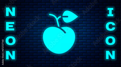Glowing neon Peach fruit or nectarine with leaf icon isolated on brick wall background. Vector