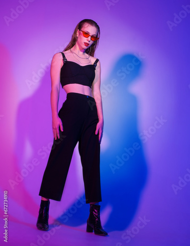 stylish confident girl stands on the background