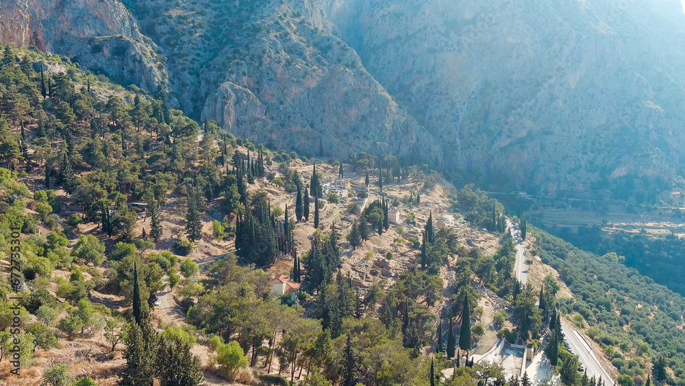 Delphi, Greece. Ruins of the ancient city of Delphi. Sunny weather in the morning, Summer, Aerial View
