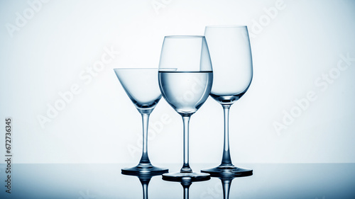 Refreshing drink in elegant stemware with reflective properties.
