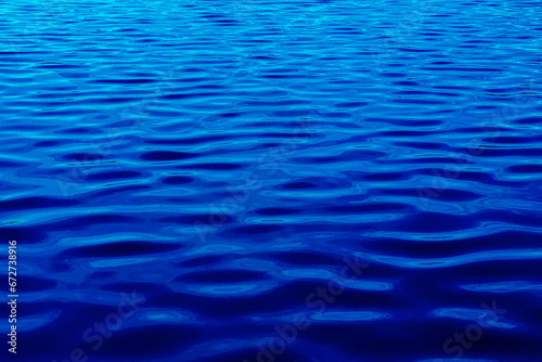 Blue ocean water surface texture background © Sumeth
