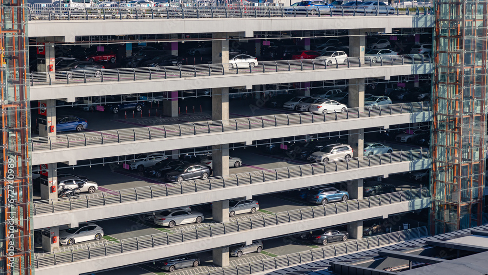 Multi-story car park building with cars Multi-story car park building with cars
