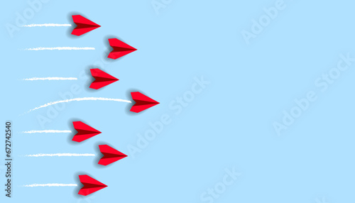 paper airplanes. red airplane changing path It is moving towards change. business creativity new idea discovery innovation technology. new year idea concept.