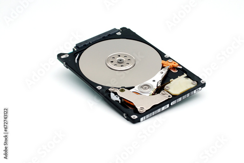 Computer hard disk interior close-up on white background