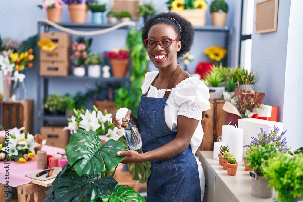 African american woman florist smiling confident working at florist store