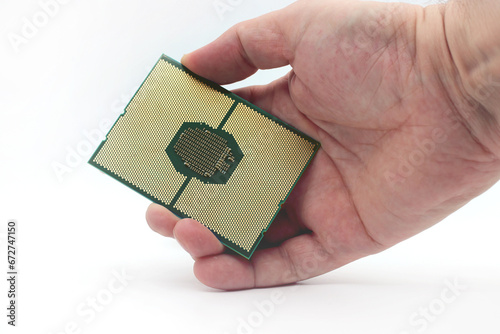New generation server processor in hand on white background