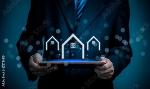 Real estate concept business, home insurance and real estate protection. Buy and sell houses and online commercial enterprises, residential realty assets.on a virtual screen..