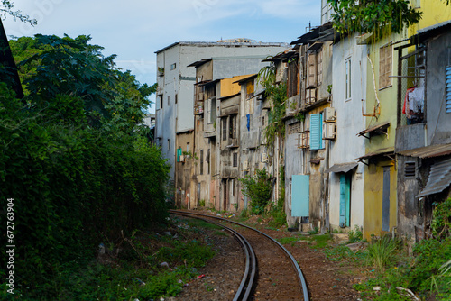 Street - railway.  A small street in Nha Trang in Vietnam with railway tracks running through the residential sector. © MASTERVIDEOSHAR