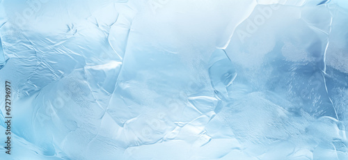 Ice texture background. The textured cold frosty surface of ice block on blue background. photo