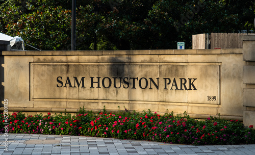 Sam Houston Park sign in Houston, Texas, in sunset photo