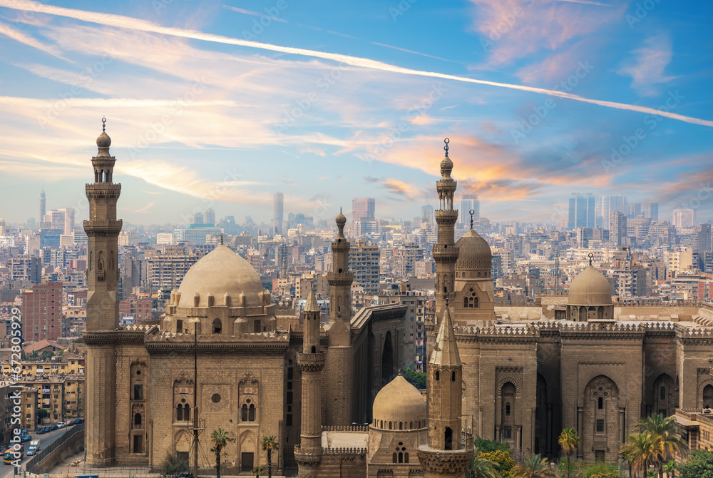 The Mosque-Madrassa of Sultan Hassan at sunset and the city view, Cairo, Egypt