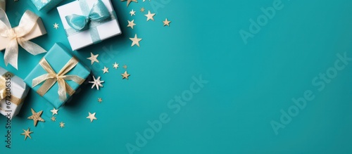 Banner with many gift boxes tied velvet ribbons and paper decorations on Green background. Christmas background, copy space