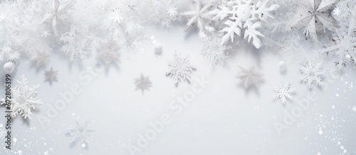 Christmas background on the white snowflakes background, copy space © ETAJOE