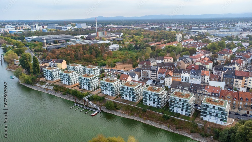 Aerial view of cityscape Mannheim surrounded by buildings and water