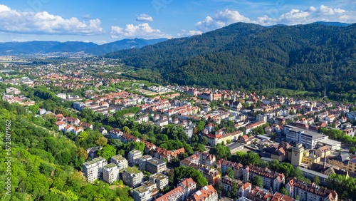 Aerial view of cityscape Freiburg im Breisgau surrounded by buildings photo