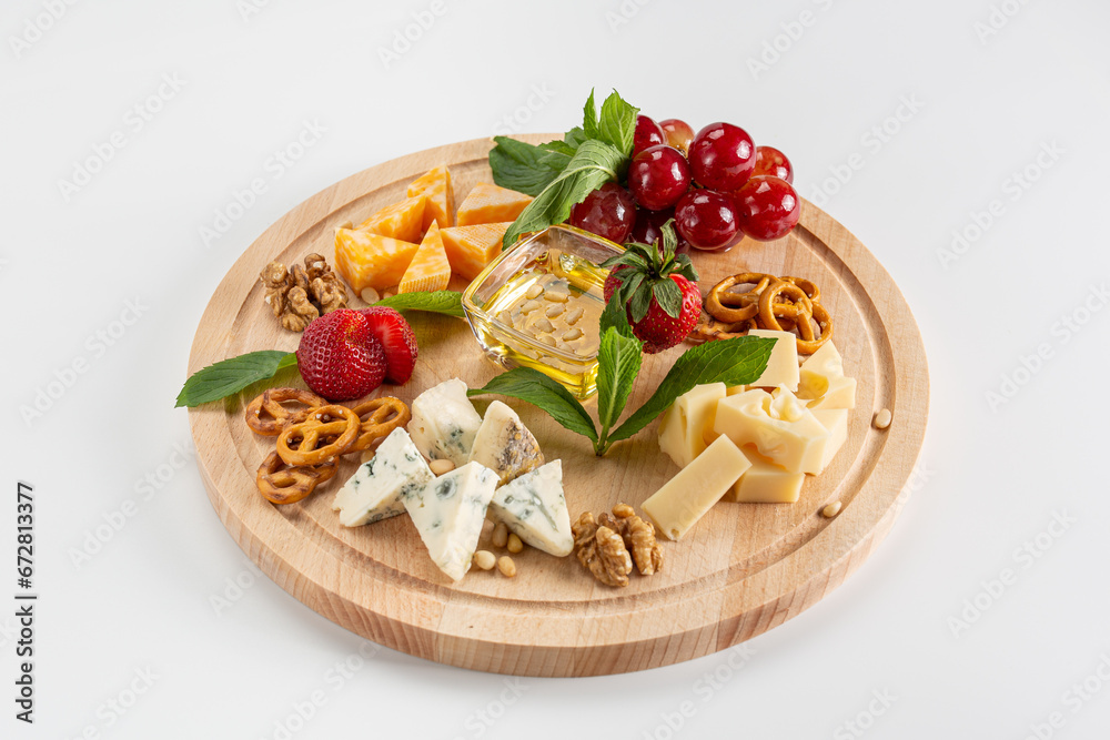  Cheese plate appetizer. Isolated seafood dish for menu.