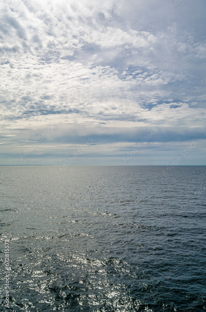 Landscape of calm sea and cloudy sky Landscape of calm sea and cloudy sky