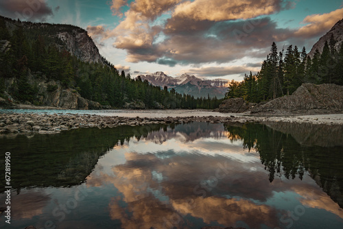 Fototapeta Naklejka Na Ścianę i Meble -  Mountains reflecting off the Bow River in Banff
