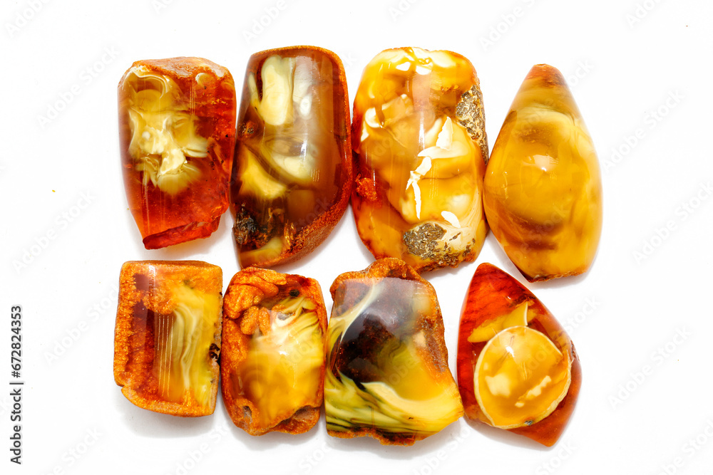 Amber nature eight pieces . A natural mineral with bright patterns. Semi-precious mineral for jewelers. Copal. Ancient fossil resin. Geology 