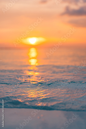 Fototapeta Naklejka Na Ścianę i Meble -  Dream meditation sunset closeup waves ripples with endless horizon. Romantic heavenly sunlight orange blue colors on sea water surface. Beautiful inspirational nature background. Panoramic art view