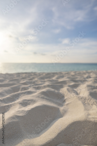 Fototapeta Naklejka Na Ścianę i Meble -  Abstract beach sunset. Pastel soft colors closeup sandy coast, calm waves crash cloudy sunrise sunlight. Idyllic island landscape. Inspire nature serenity tranquility seascape over golden sand dunes
