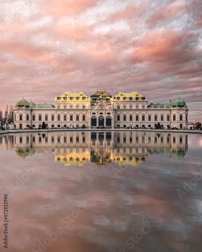 Photography A vertical shot of the Austrian Gallery Belvedere reflected on the water