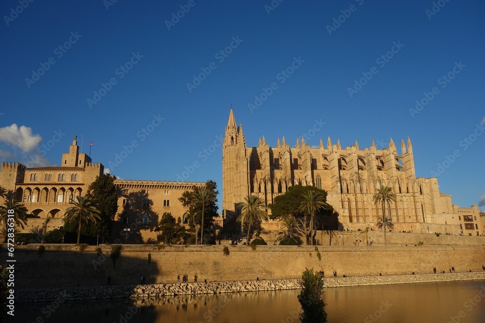 Beautiful shot of the Palma Cathedral on a riverbank in Palma, Spain