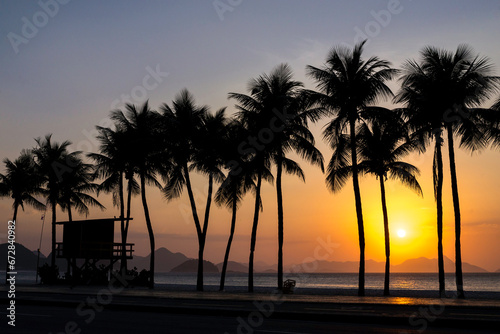 Palm Trees and Lifeguard Post in Copacabana Beach on Sunrise © Donatas Dabravolskas