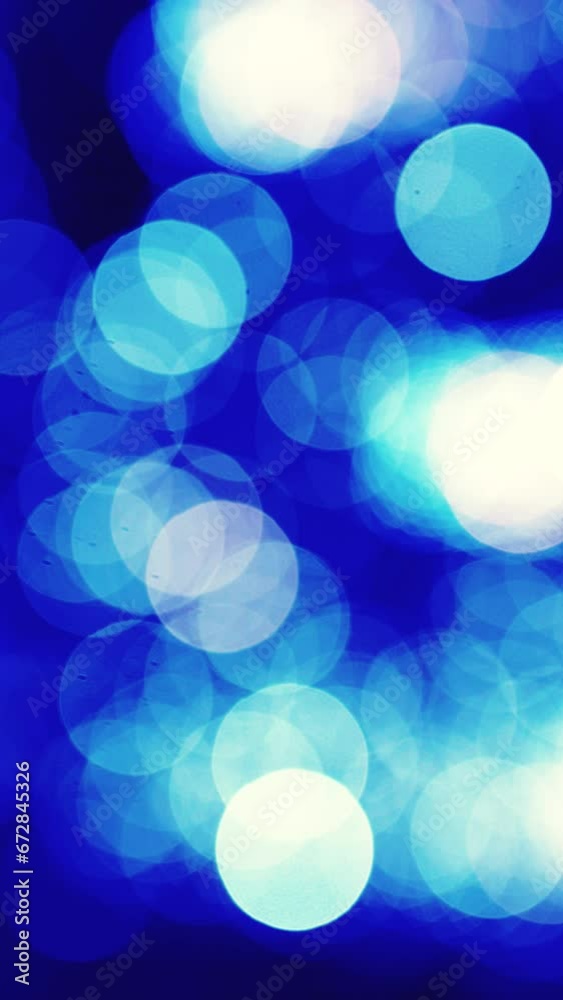 Blue bokeh Background, blured Blue bokeh particle Background. Vertical, vertical video background.
