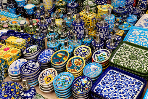 Handmade crockery and serve wares on the sale in the Pune, India, street market. Beautiful ceramic crockery selling in the flee market.