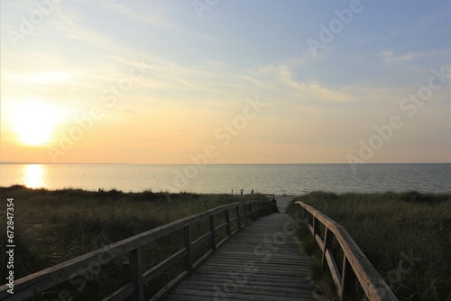 Wooden boardwalk to the Baltic Sea beach.