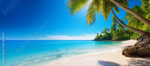 A composition featuring a pristine tropical beach with crystal-clear azure waters and palm trees. Copy space, banner