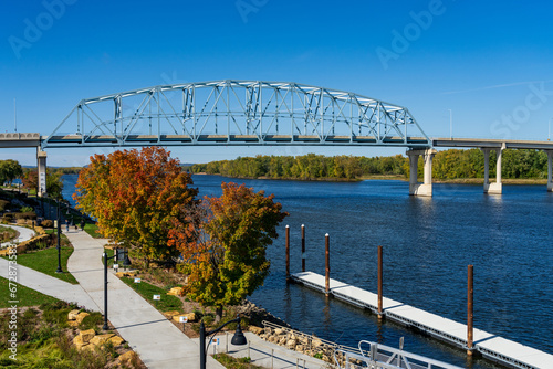 Garden and pier alongside the Mississippi River in the town of Wabasha in Minnesota in autumn photo